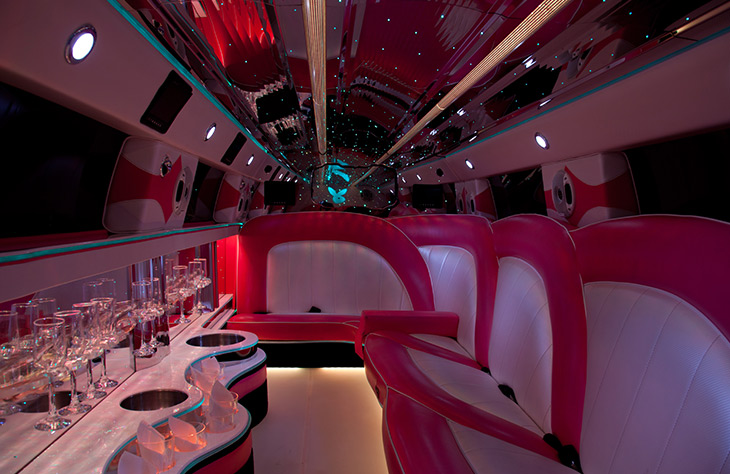 Pink limo bus hire